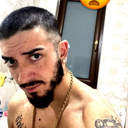 Intense Italian Bodybuilder Showing Muscles