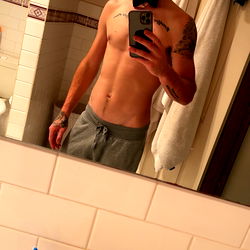 A Model Posing with a Bathrobe and Tie