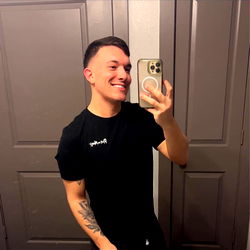 Andrew, the Tattooed Barber, Showcases his Fresh Cut