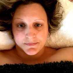 Relaxed woman in a spa-like setting