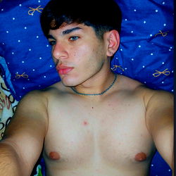 Agustín Fernández: A Young Adult Model with a Shirtless Selfie
