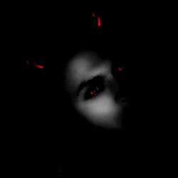 A mysterious figure looms in the darkness, eyes glowing with an eerie red light.
