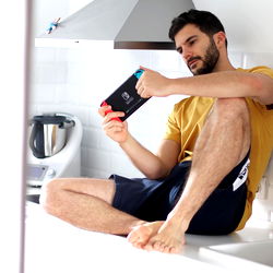 Jesús González, 35, Male Model in Kitchen