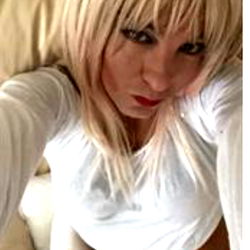 Angie, OnlyFans Model from Glasgow, Captivates with Her Striking Blonde Hair and Tattooed Body
