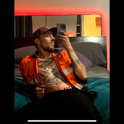 King Burnsy, a young adult Australian influencer, in a candid moment captured on a phone.