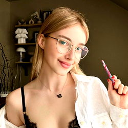 Stylish Female Model with Glasses, Shirt and Tattoo