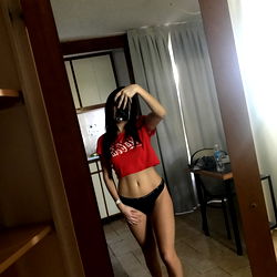 OnlyFans Model Posing in a Hotel Room Mirror