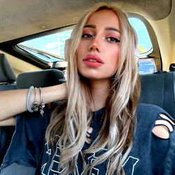 Stylish OnlyFans Model Lana Lancy Posing in a Car