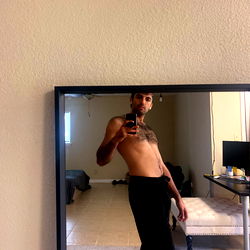 Qasim in a mirror selfie