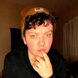 August Beck, a Young Model Pondering with Finger Under Chin