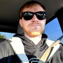 Shawn F, A Young Man in a Car Seat