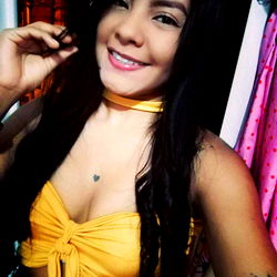 Angie Vanessa in a Yellow Bikini Top