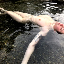 Hannah, an OnlyFans Model, Relaxing in a Natural Setting