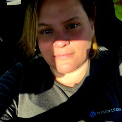 A Person Taking A Selfie In A Car