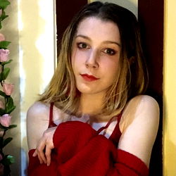 Young Female Model in Red Shirt