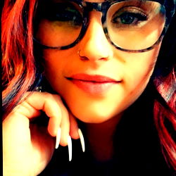 Stylish Woman with Red Hair and Glasses