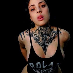 OnlyFans Model Tattoo Doll Posing in Bedroom