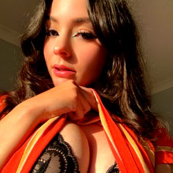 Onlyfans Model Minacakes in a Red Shirt