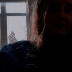 Woman Smiling in Window