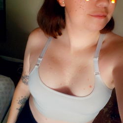 Cute Girl in Tank Top Taking Selfie