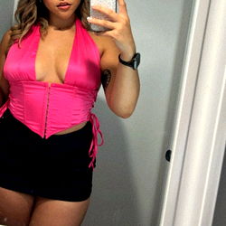 OnlyFans Model Thick Cheeks Poses in Pink Haltertop