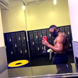 D.D in Gym Mirror, Showing Biceps and Core