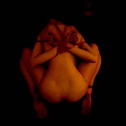 Sensual Model in a Dark Studio