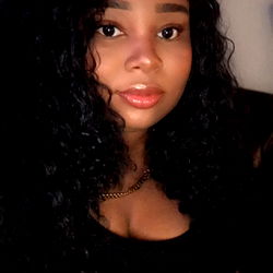 Stylish Woman in Long Hair with OnlyFans Model Name Alexis D Gaiter