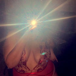 Adult model Alli in intimate photoshoot