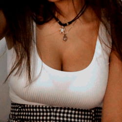 OnlyFans Model Ana Lucia, Poised in a Checkered Top