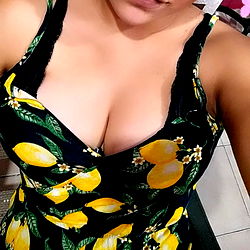 Fashionable Amor Gótico in a Floral Dress