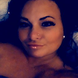 Heather, a young adult woman sharing a peek of her daily life in her bedroom.