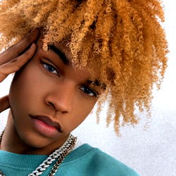 Vibrant Celebrity Portrait with Colorful Hairstyle