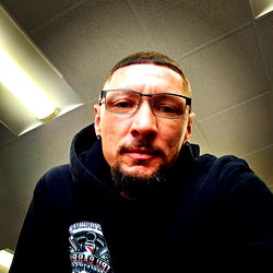 Man in Black and White Glasses