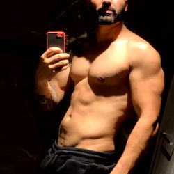 Fit and Muscular Model Showcasing Abs