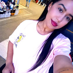 Stefany, Venezuelan OnlyFans Model Posing with a Pink T-Shirt