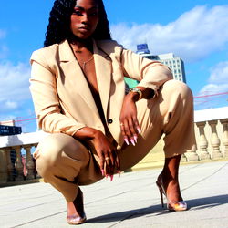 OnlyFans Model in Crop Top and Pants, Posing for Camera