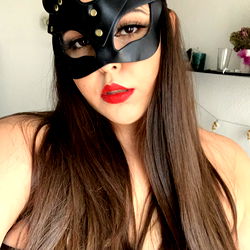 OnlyFans Model Mrs. Kyle in a Leather Mask and Lingerie