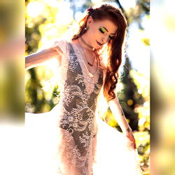 Model SchuylarWitch in a Cream Dress at Outdoors