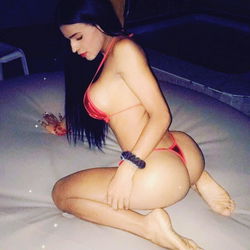 Sensual Model Alexa Fox, Crouched on Air Sofa