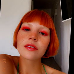 Nelly - Vivid Red Hair, Bold Lipstick