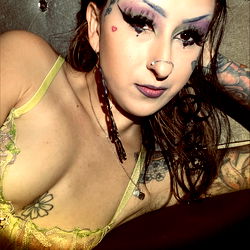 Model in Tattoos and Drinks