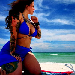 Busty Female Model Posing at the Beach