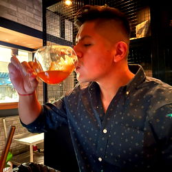 A Man Savoring a Glass of Beer