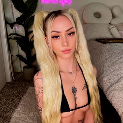 Model Photo with Tattoos and Bright Hair