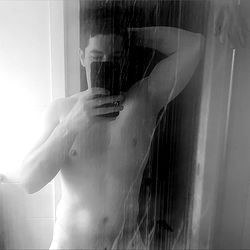 Fit Guy in Bathroom Mirror