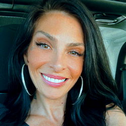 Alice's Joyful Pose in Car