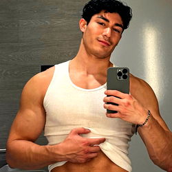 Muscular Model Posing in Gym