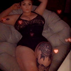 OnlyFans Model AJ in a Stylish and Confident Pose on Chair