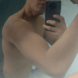 OnlyFans Model Alessandro Sebastián, Shirtless in a Bathroom Mirror
